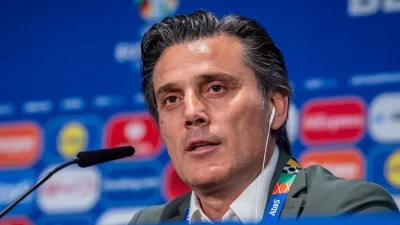 Berlin Olimpiyat Stadyumu’nda düzenlenen basın toplantısında konuşan A Milli Takımımızın